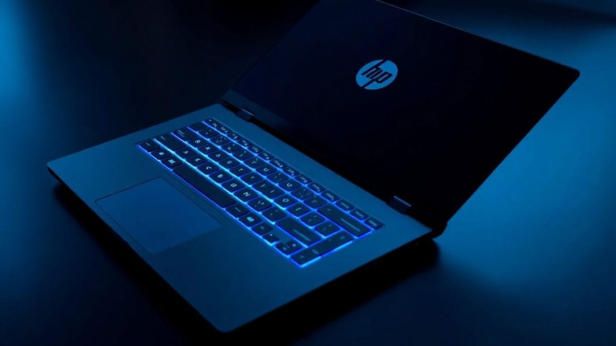 HP Victus 15 gaming laptop with blue backlit keyboard.